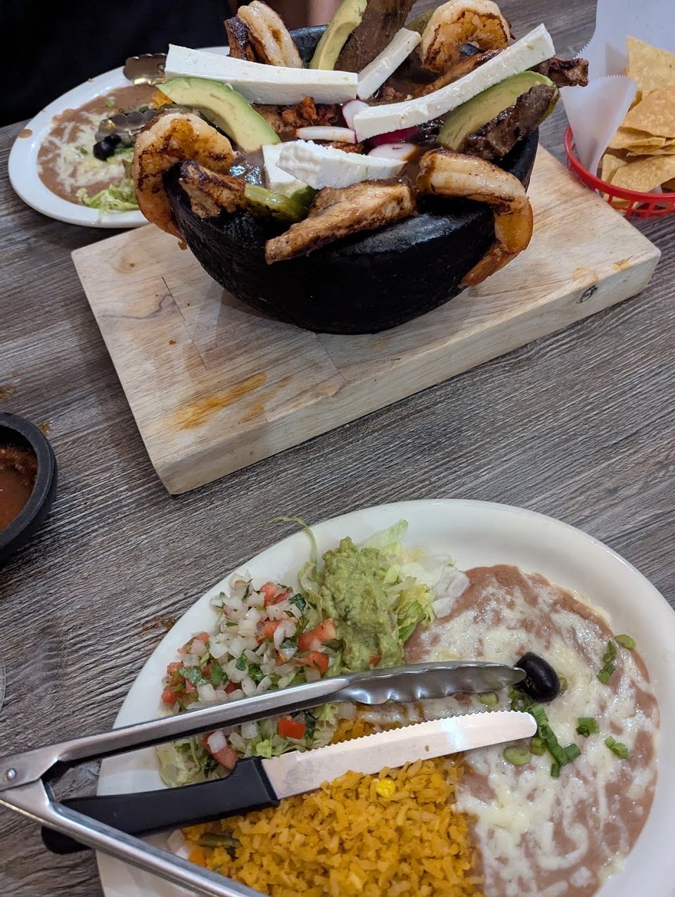 Mexican menu featuring enchiladas, burritos, and flautas.